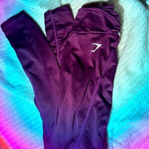 Gymshark leggings in a dark purple color size XS.